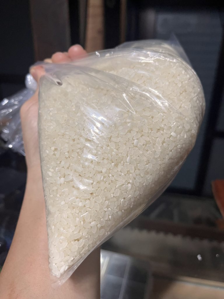 手打で育った米こしき米